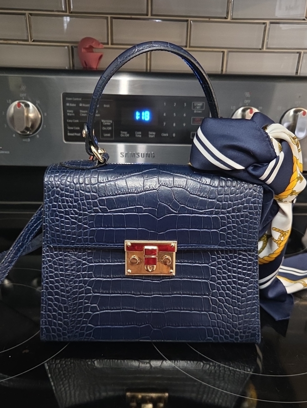 Elegant Navy Croc-Embossed Top-Handle Bag with Gold Hardware